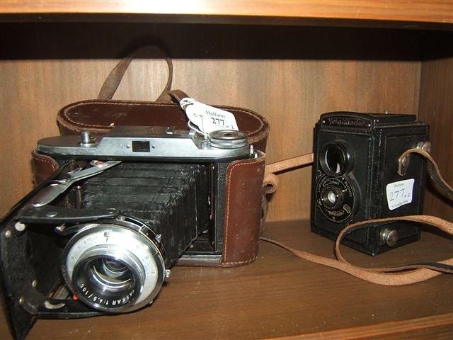 Appraisal: A VOIGTLANDER VESSA I FOLDING CAMERA and a further Voightlander