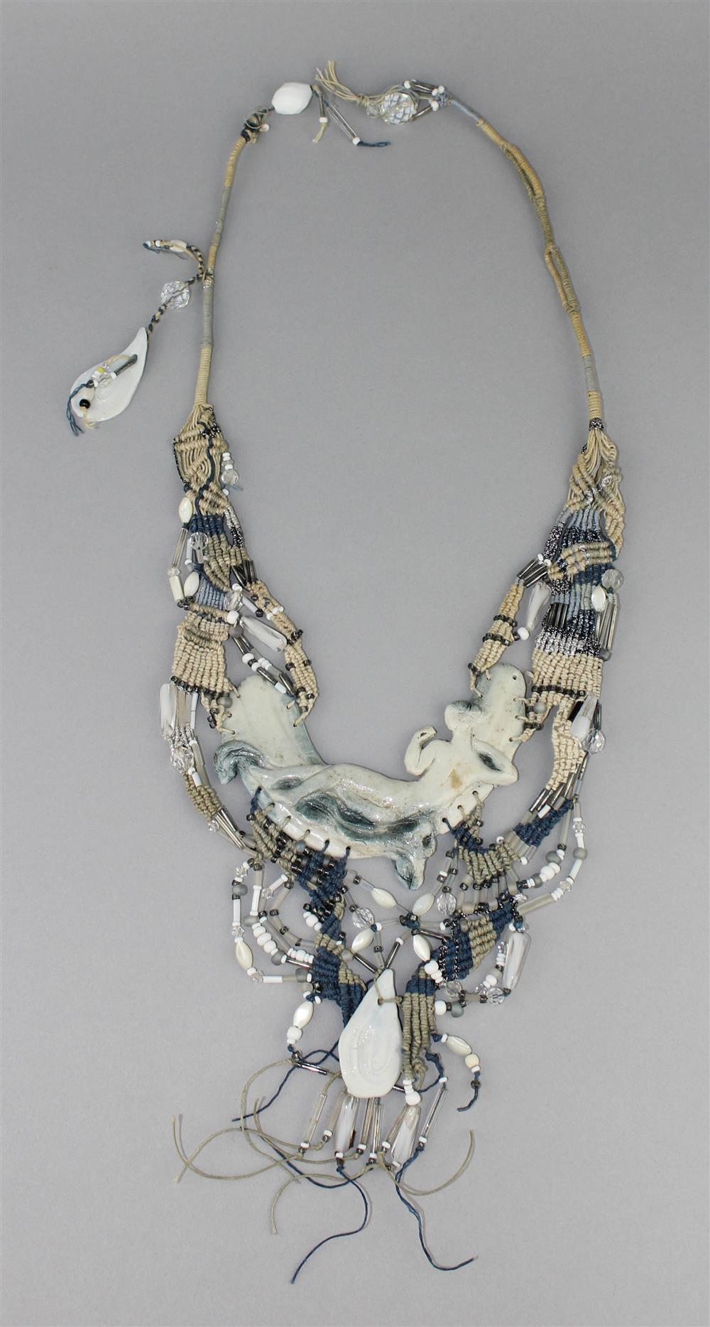 Appraisal: FIBER ART CERAMIC AND MACRAME NECKLACE the handmade necklace incorporates