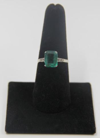 Appraisal: JEWELRY kt Gold Emerald and Diamond Ring One central emerald