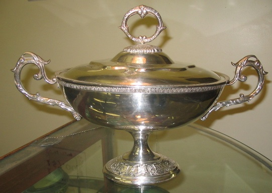 Appraisal: A SILVERPLATED COVERED CENTER BOWL on pedestal ornate base with