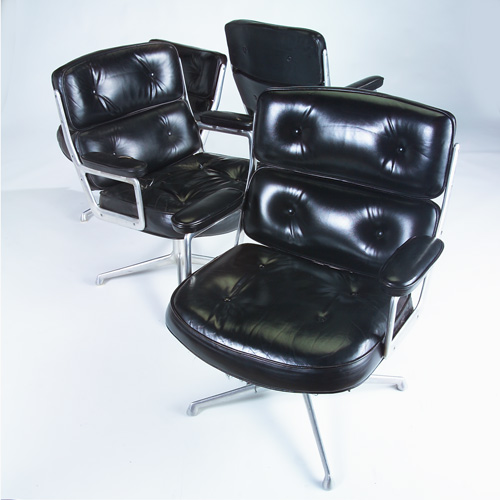 Appraisal: CHARLES EAMES HERMAN MILLER Four Time-Life armchairs with tufted black