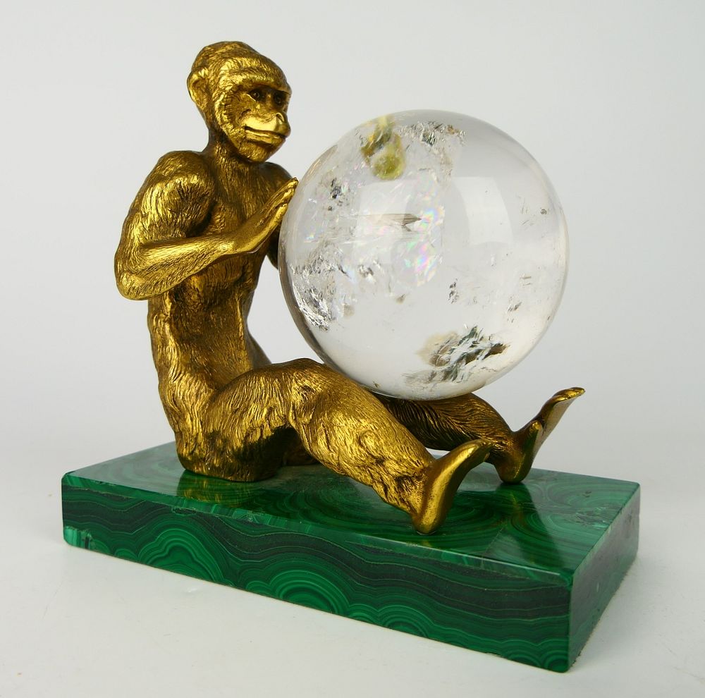 Appraisal: GILT BRONZE MONKEY HOLDING A QUARTZ SPHERE GILT BRONZE MONKEY