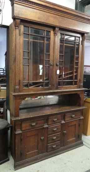 Appraisal: th c two part oak kitchen cupboard '' W ''