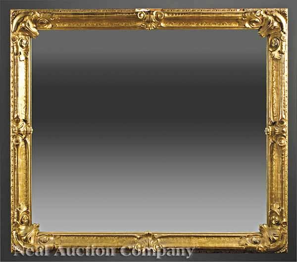 Appraisal: An Antique English Carved and Giltwood Mirror th c cove