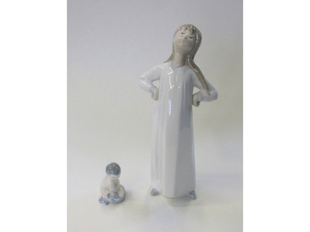 Appraisal: Royal Copenhagen figure of a mermaid and a Lladro figure