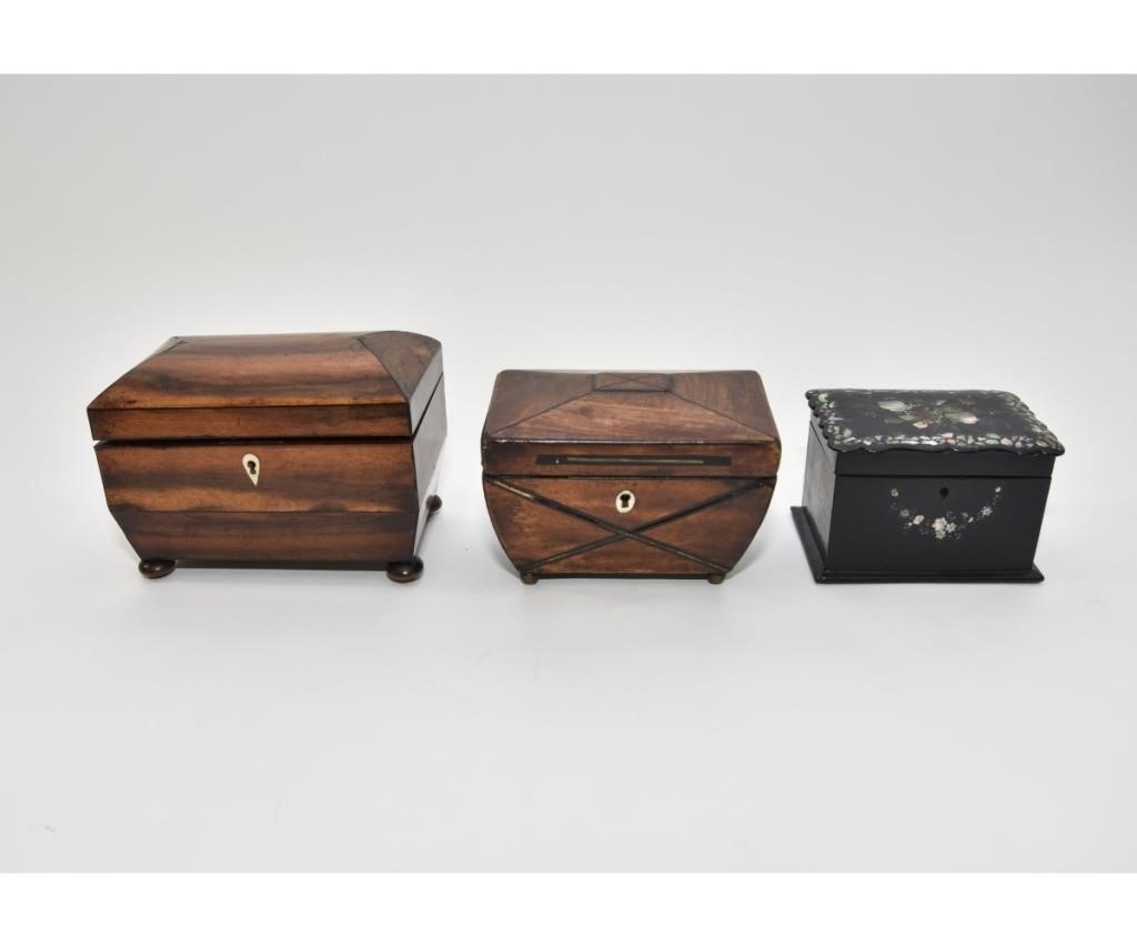 Appraisal: Three tea caddies two Georgian mahogany tea caddies circa largest