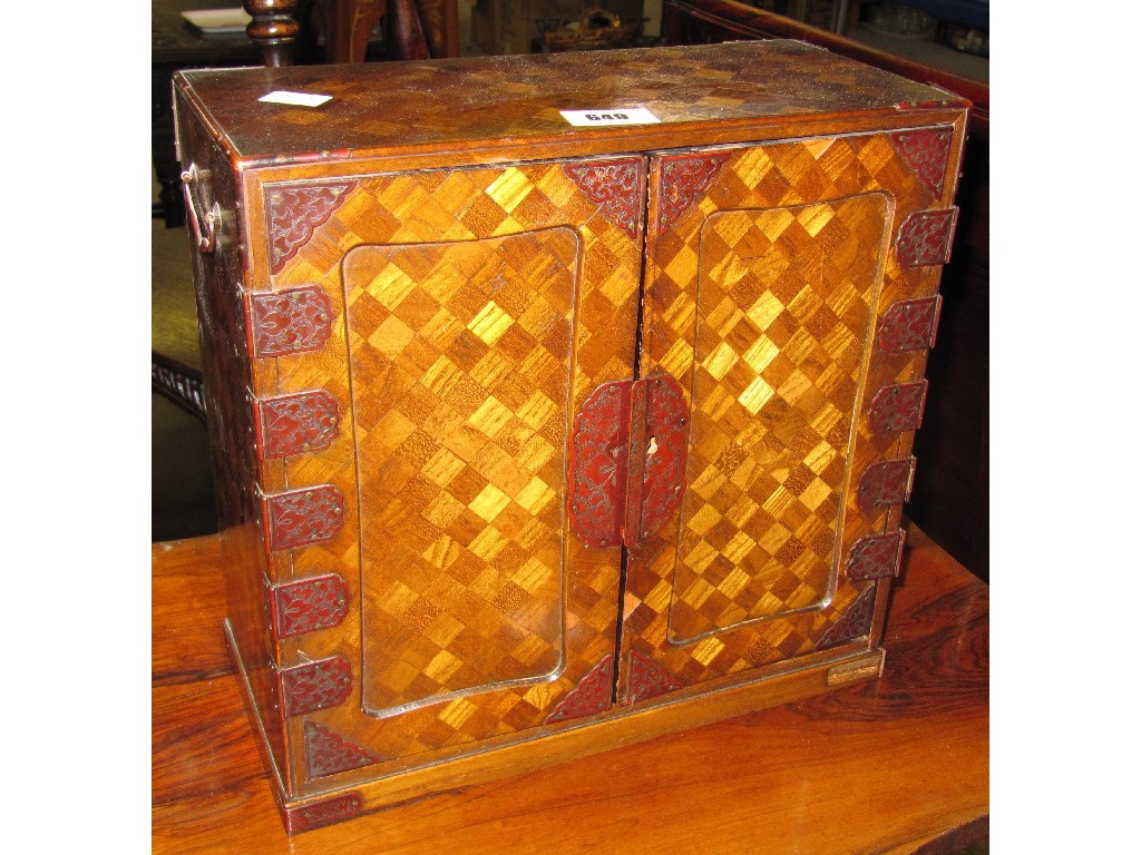 Appraisal: Oriental parquetry inlaid table cabinet