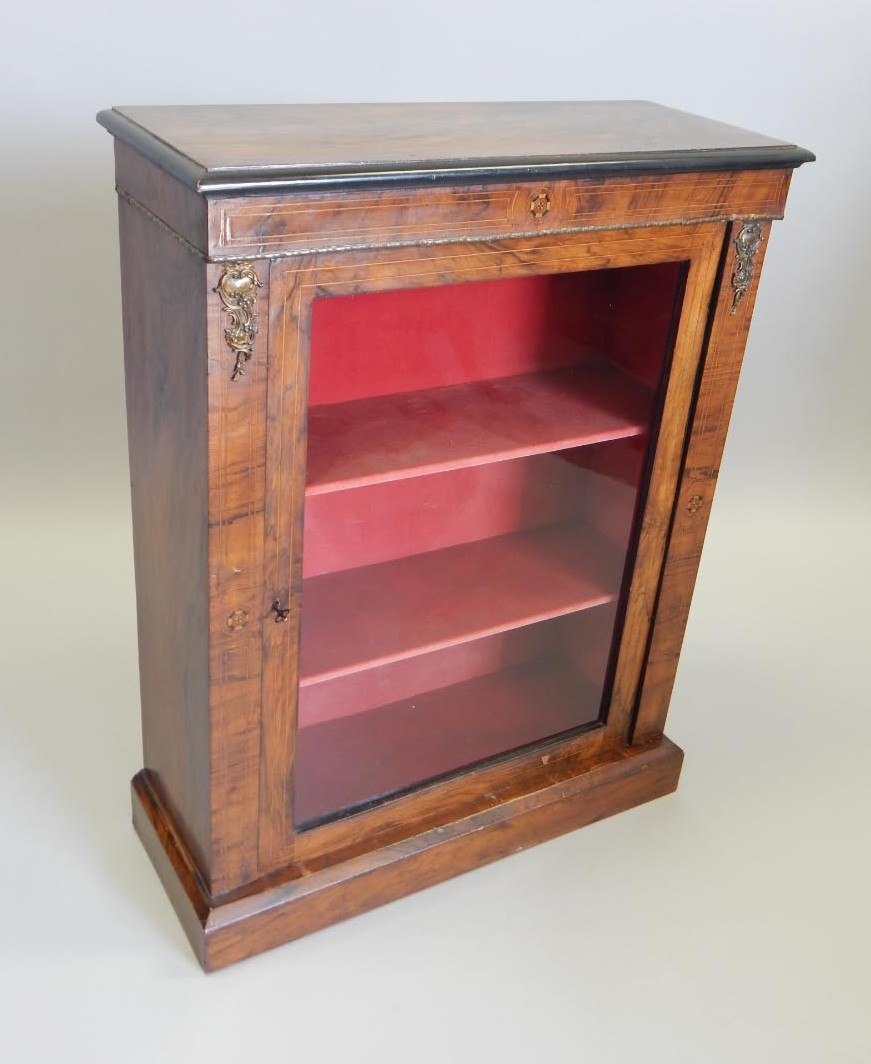 Appraisal: A Victorian walnut and marquetry pier cabinet with gilt metal