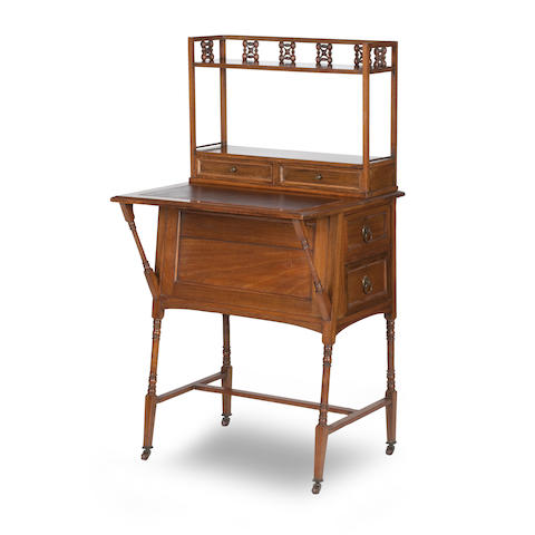 Appraisal: In the manner of Christopher Dresser A walnut writing desk