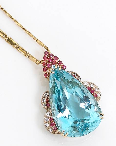 Appraisal: An aquamarine diamond and ruby pendant necklace aquamarine weighing approximately