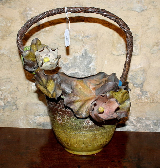 Appraisal: A FRENCH TOLEWARE BASKET with painted flower decoration and embossed