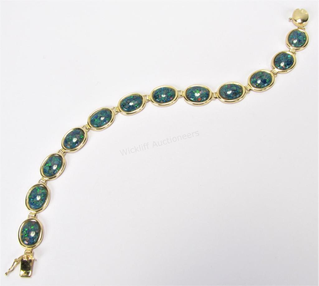 Appraisal: A K yellow gold mosaic opal inlay oval link bracelet