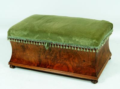 Appraisal: A VICTORIAN BURR WALNUT OTTOMAN of waisted oblong form the