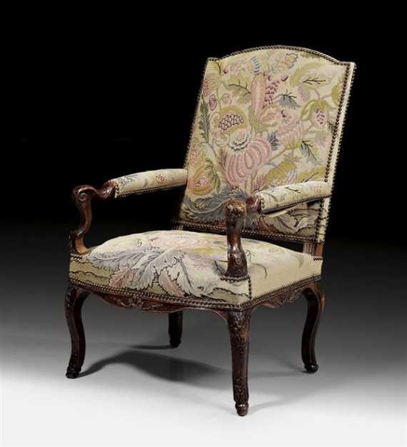 Appraisal: WALNUT ARMCHAIR Louis XV German th century Shaped and carved