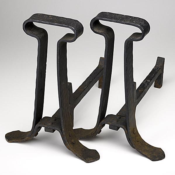 Appraisal: GUSTAV STICKLEYRare pair Swedish iron andironsNote Gustav Stickley discussed in