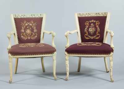 Appraisal: A Pair of Carved and Painted Arm Chairs With carved