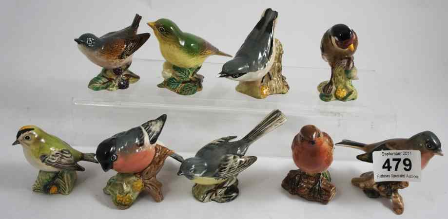 Appraisal: A collection of Beswick Birds comprising Goldfinch Wagtail Chaffinch Goldcrest