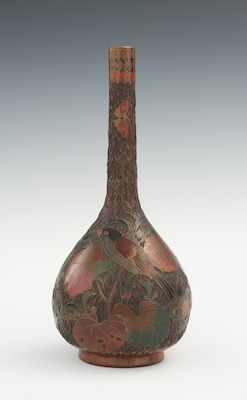 Appraisal: A Totai Bark Bottle Bottle shaped vase with bark carved