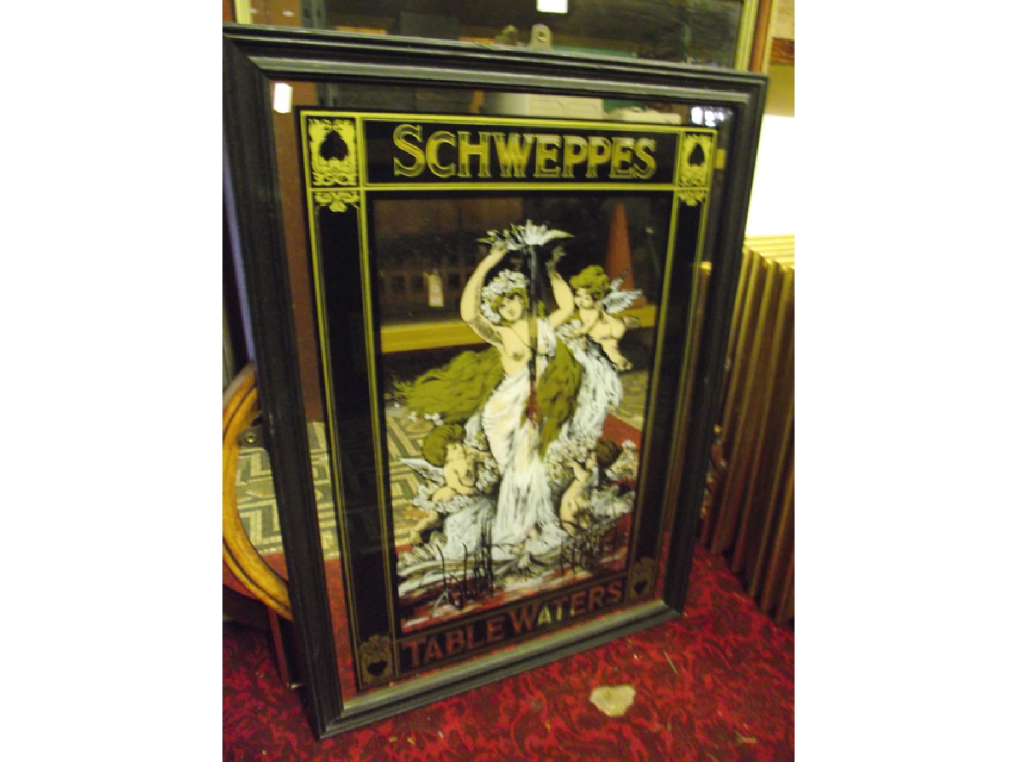 Appraisal: A Schweppes tablewaters advertising mirror panel housed within a moulded