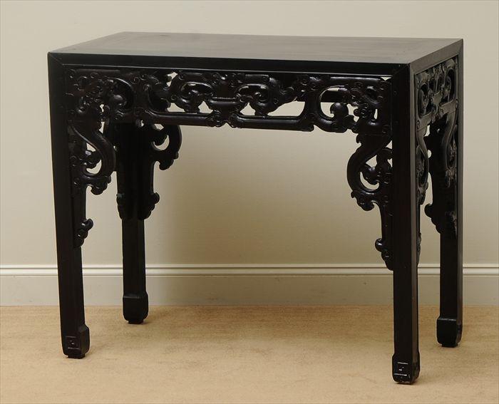 Appraisal: CHINESE BLACK LACQUER ALTAR TABLE The rectangular top above pierced