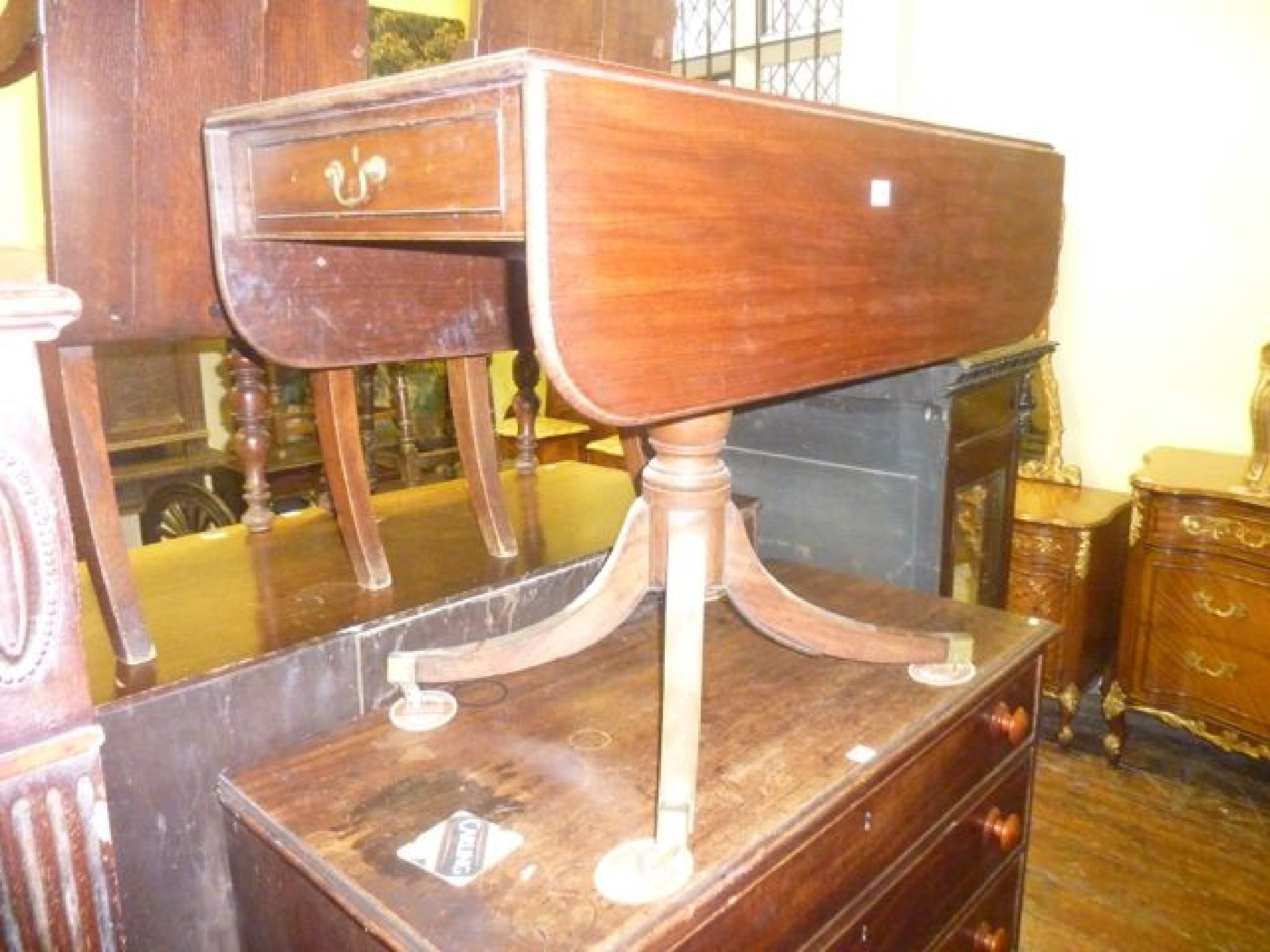 Appraisal: A mid th century mahogany Prembroke breakfast table of usual