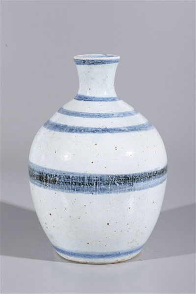 Appraisal: Chinese white ceramic vase with repeating blue circles to neck