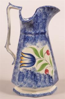 Appraisal: Blue Spatter Tulip Pattern Paneled Pitcher Blue Spatter Tulip Pattern