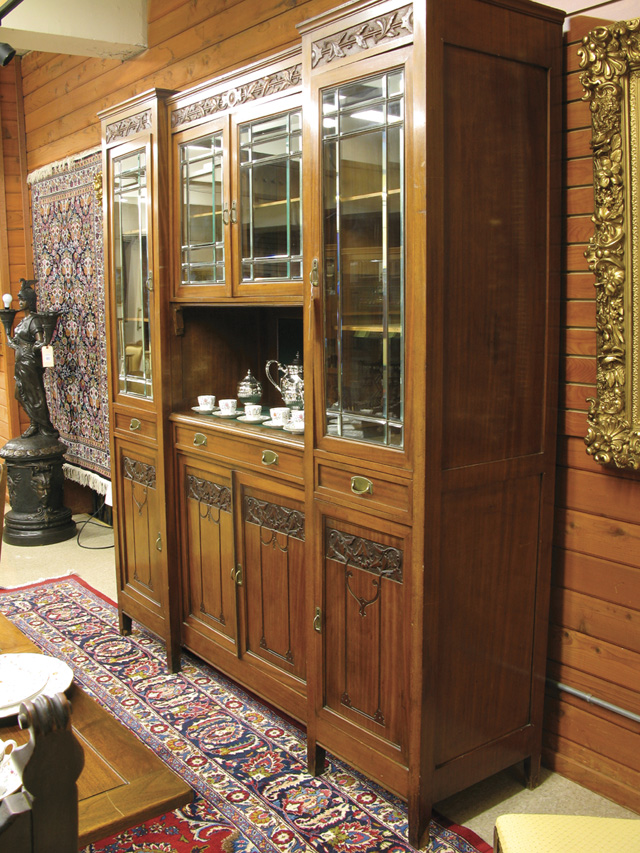 Appraisal: CARVED MAHOGANY AND BEVELED GLASS CHINA HUTCH Belgian early th