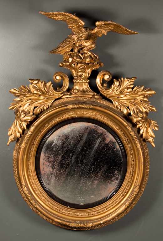 Appraisal: Classical carved gesso giltwood eagle girandole mirror probably New York