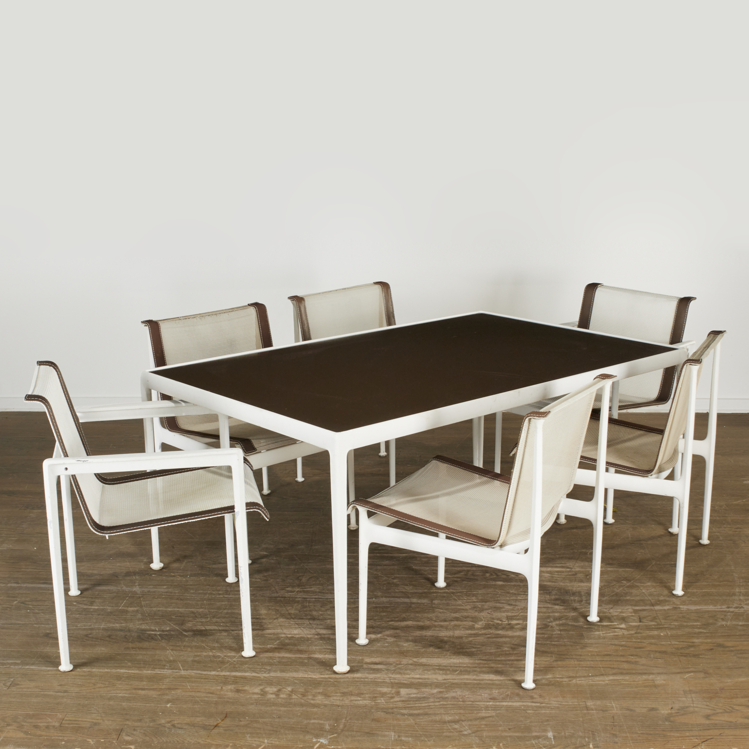 Appraisal: RICHARD SCHULTZ DINING TABLE AND CHAIRS c enameled aluminum leather