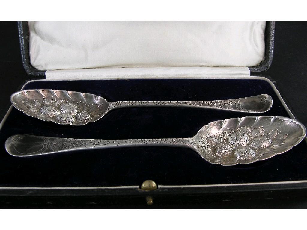 Appraisal: Pair of cased George III berry spoons the handle engraved