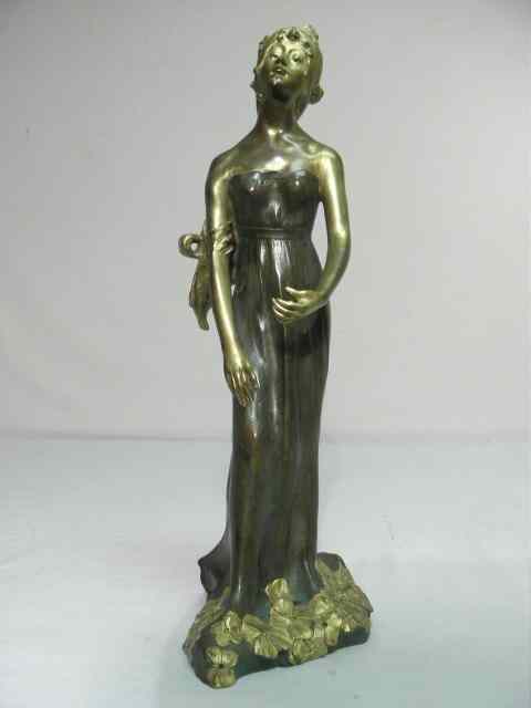 Appraisal: Art nouveau bronze sculpture of a woman Gilt patinated Depicts