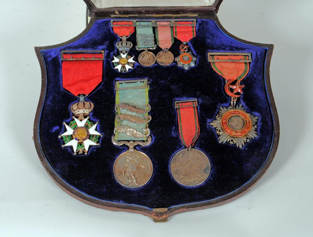 Appraisal: A GROUP OF FOUR CRIMEA WAR MEDALS presented to Major