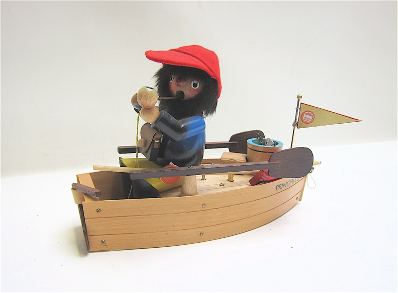 Appraisal: STEINBACH WOOD FIGURAL MUSIC BOX fisherman in boat wind-up music