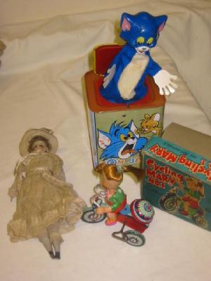 Appraisal: A bisque shoulder head girl doll with fixed blue glass