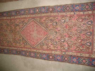 Appraisal: AN ANTIQUE PERSIAN BAKHSHAISH RUG the camel field with repeating