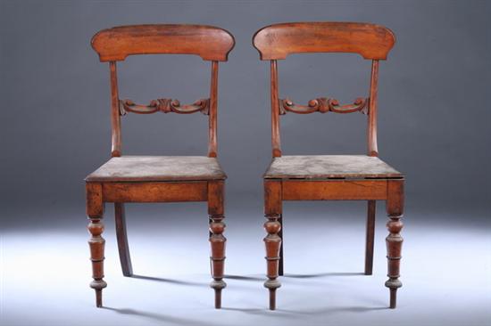 Appraisal: PAIR LATE EMPIRE WALNUT HALL CHAIRS th century Rounded crestrail