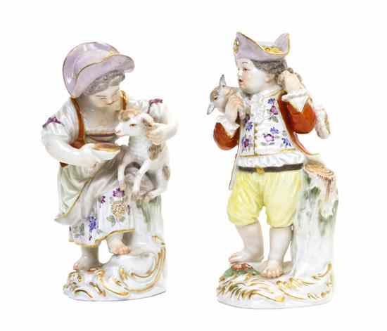 Appraisal: A Pair of Meissen Porcelain Figures depicting a girl and