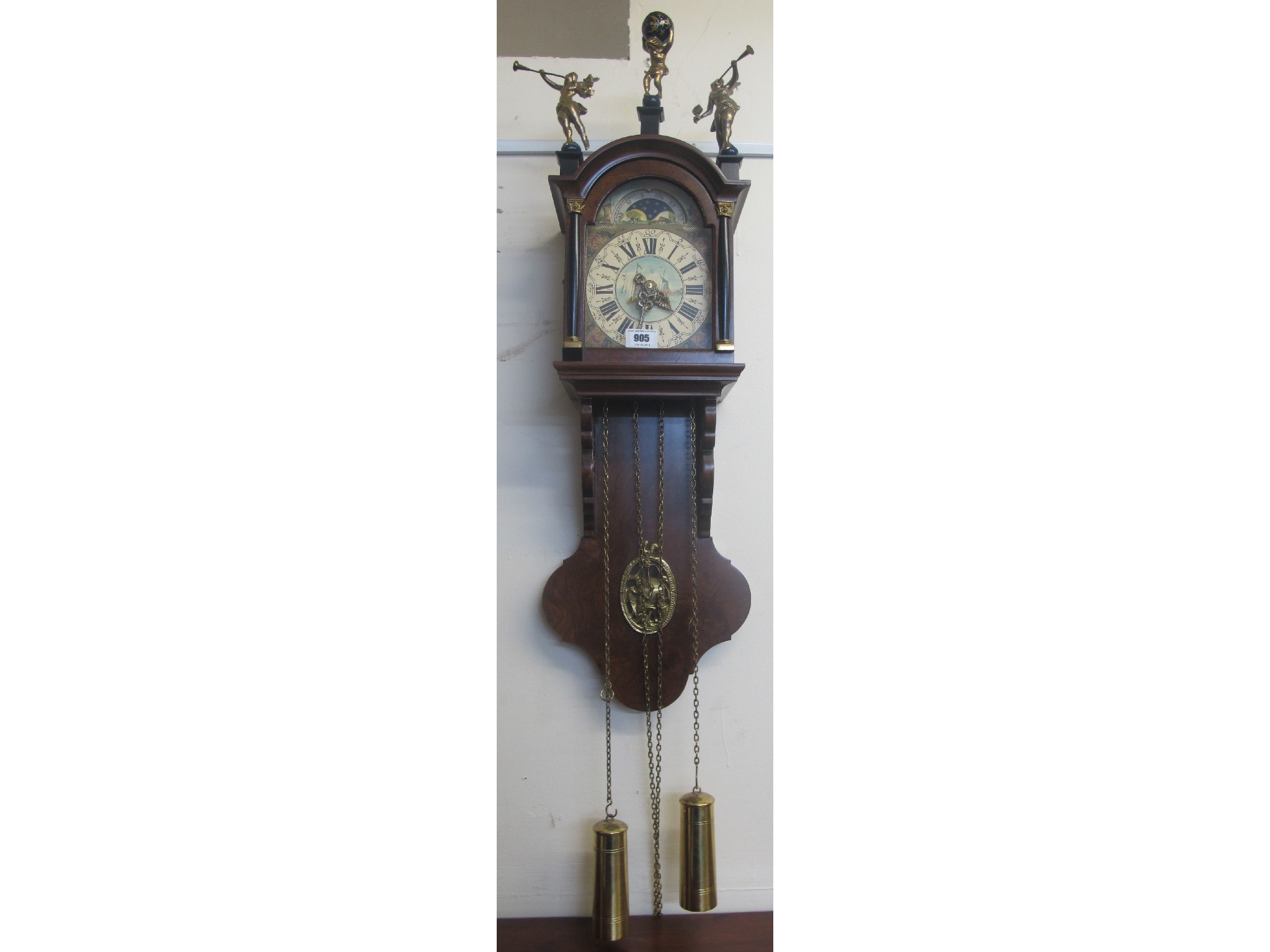 Appraisal: A reproduction wall clock