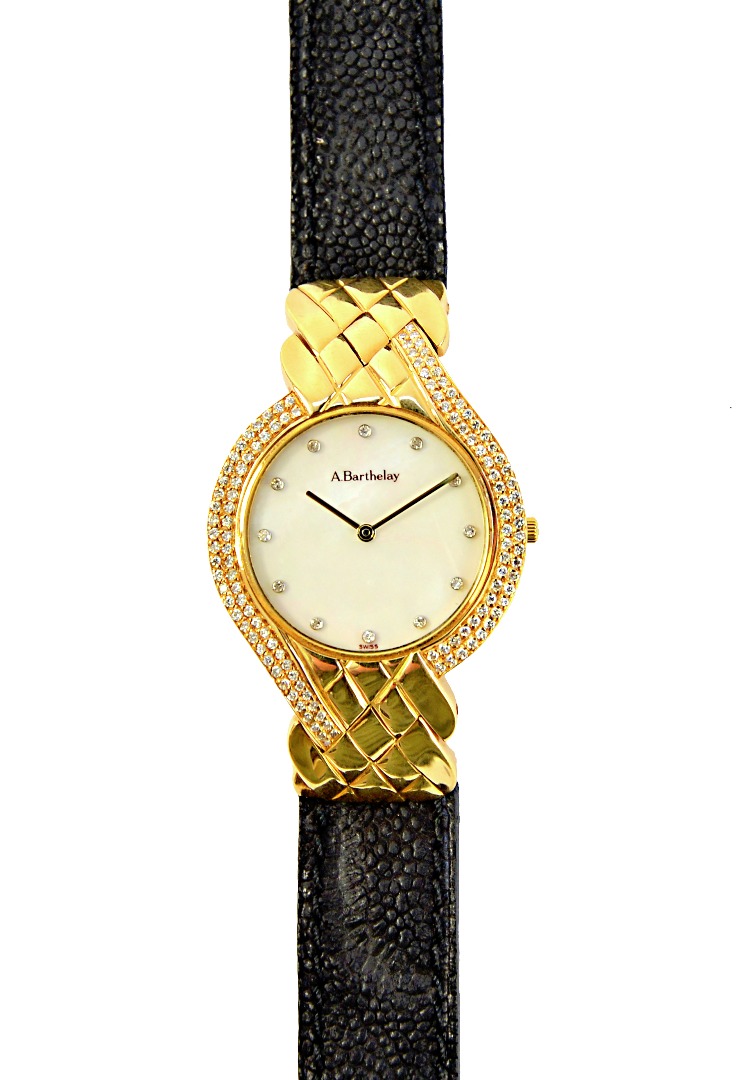 Appraisal: A gold diamond set and mother of pearl dress wristwatch