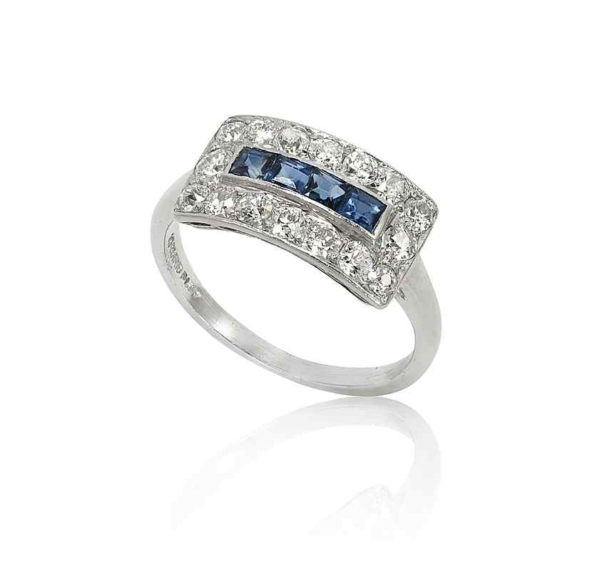 Appraisal: PLATINUM ART DECO SAPPHIRE DIAMOND DECK RING The deck centers