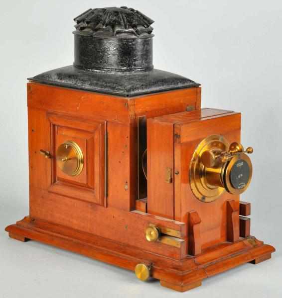 Appraisal: Early Brass Mahogany Magic Lantern Description Late s Working Condition