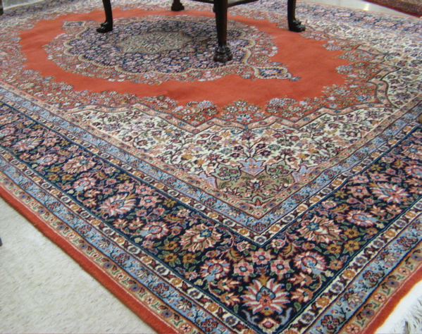 Appraisal: HAND KNOTTED TURKISH CARPET Persian Tabriz design comprising a large