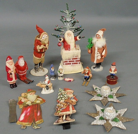 Appraisal: Group of Christmas Santa figures and Belsnickles some composition two