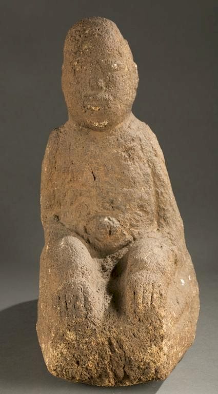 Appraisal: Seated stone figure A stone seated male figure h x