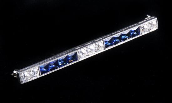 Appraisal: EDWARDIAN PLATINUM DIAMOND AND SAPPHIRE BAR PIN Seven old mine-cut