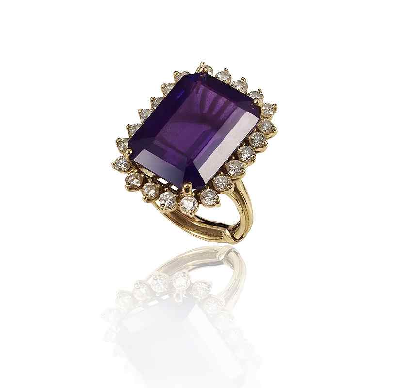 Appraisal: CT AMETHYST DIAMOND RING K yellow gold ring centers one