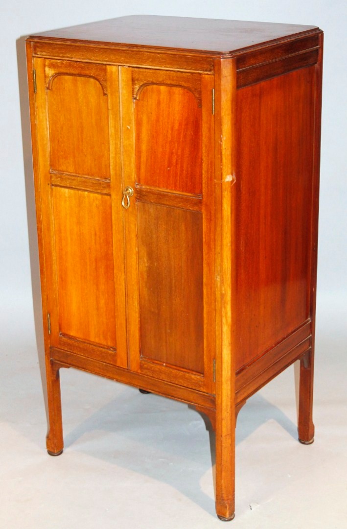 Appraisal: An early thC mahogany sheet music cabinet the canted moulded