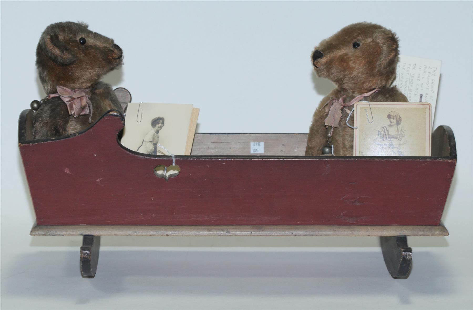 Appraisal: CRADLE WITH TWO BEARS AND THE PROVENANCE This group of