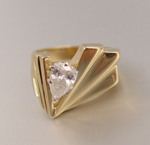 Appraisal: CT PEAR DIAMOND FASHION RING K yellow gold fashion ring